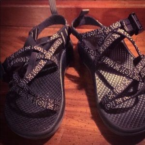 Chaco black and white strappy sandals.